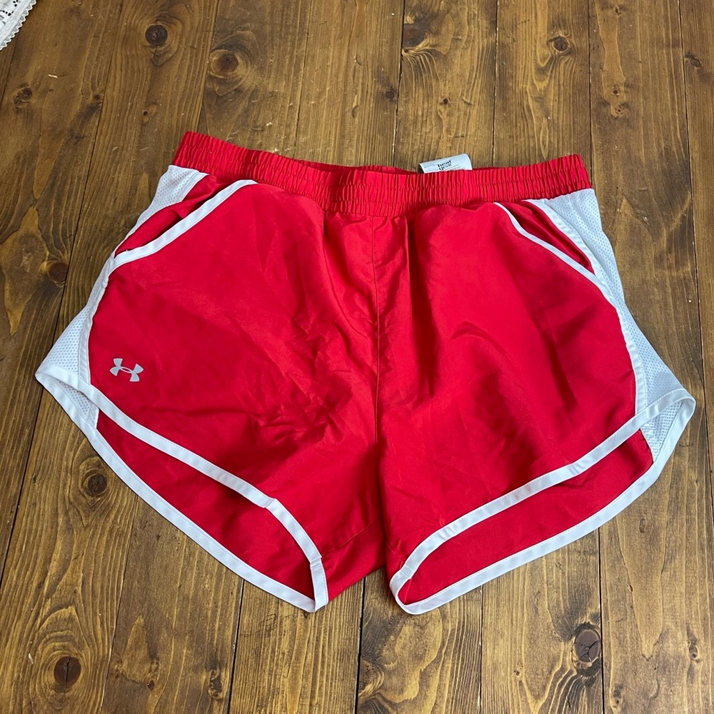 Under Armour size medium red and white Heat gear loose fit athletic shorts